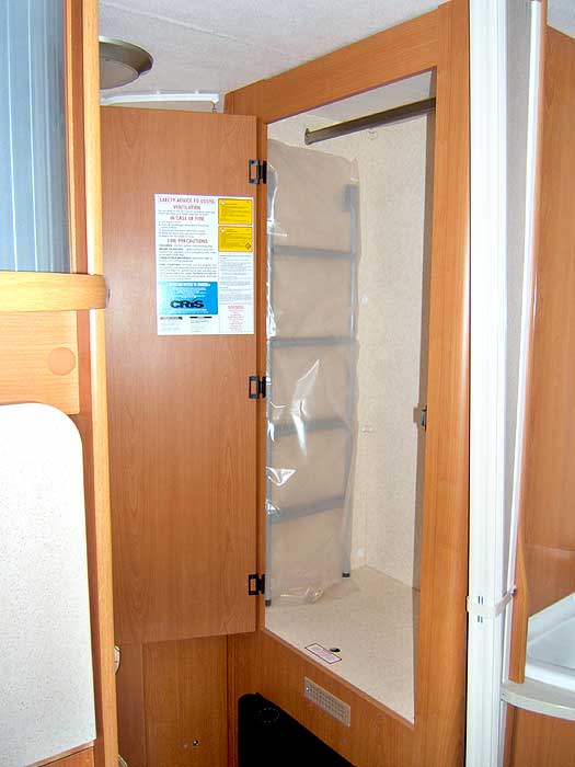 The large wardrobe with hanging rail just outside the bedroom.